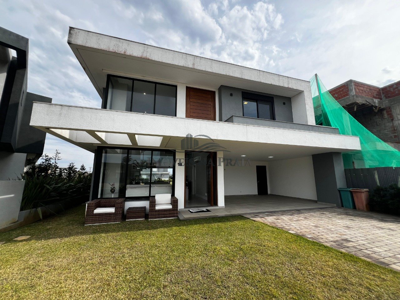 Foto 2 — Casa em condomínio no Riviera Xangri-Lá.