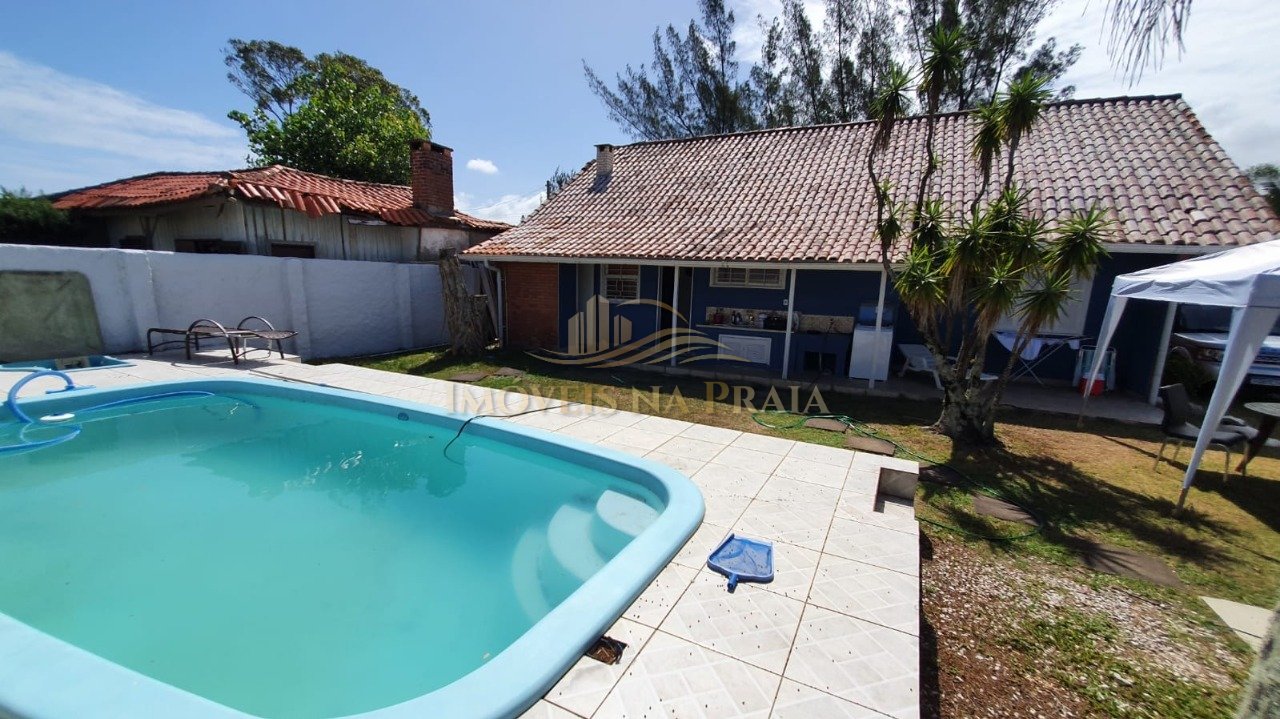 Foto 5 — Casa com 4 dormitórios em Atlântida.