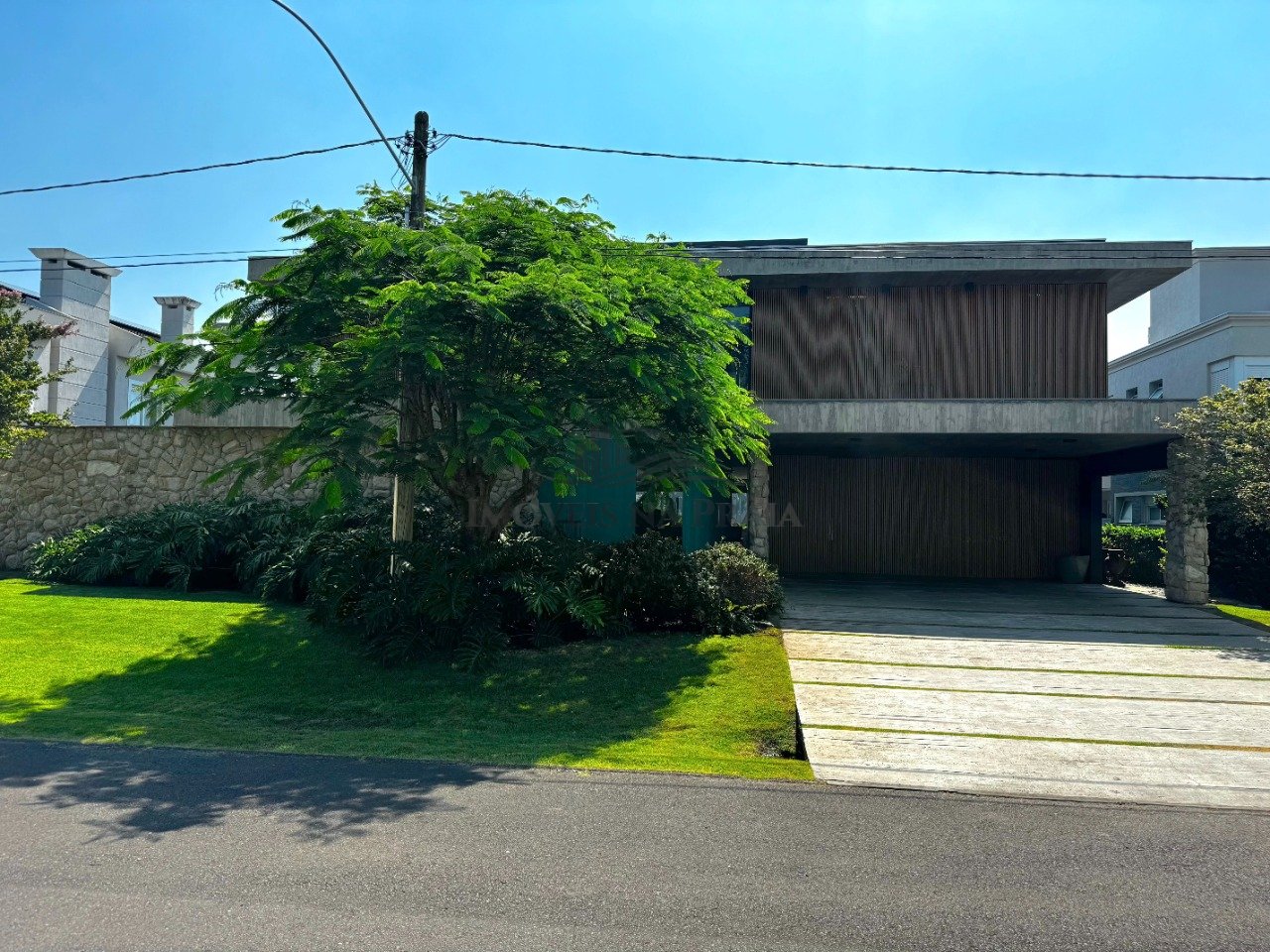 Foto 3 — Casa em Condomínio no Bosques de Atlântida.
