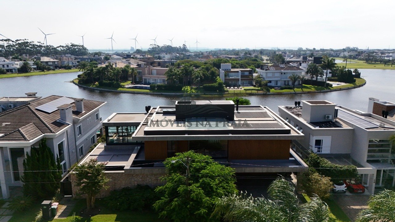 Foto 12 — Casa em Condomínio no Bosques de Atlântida.