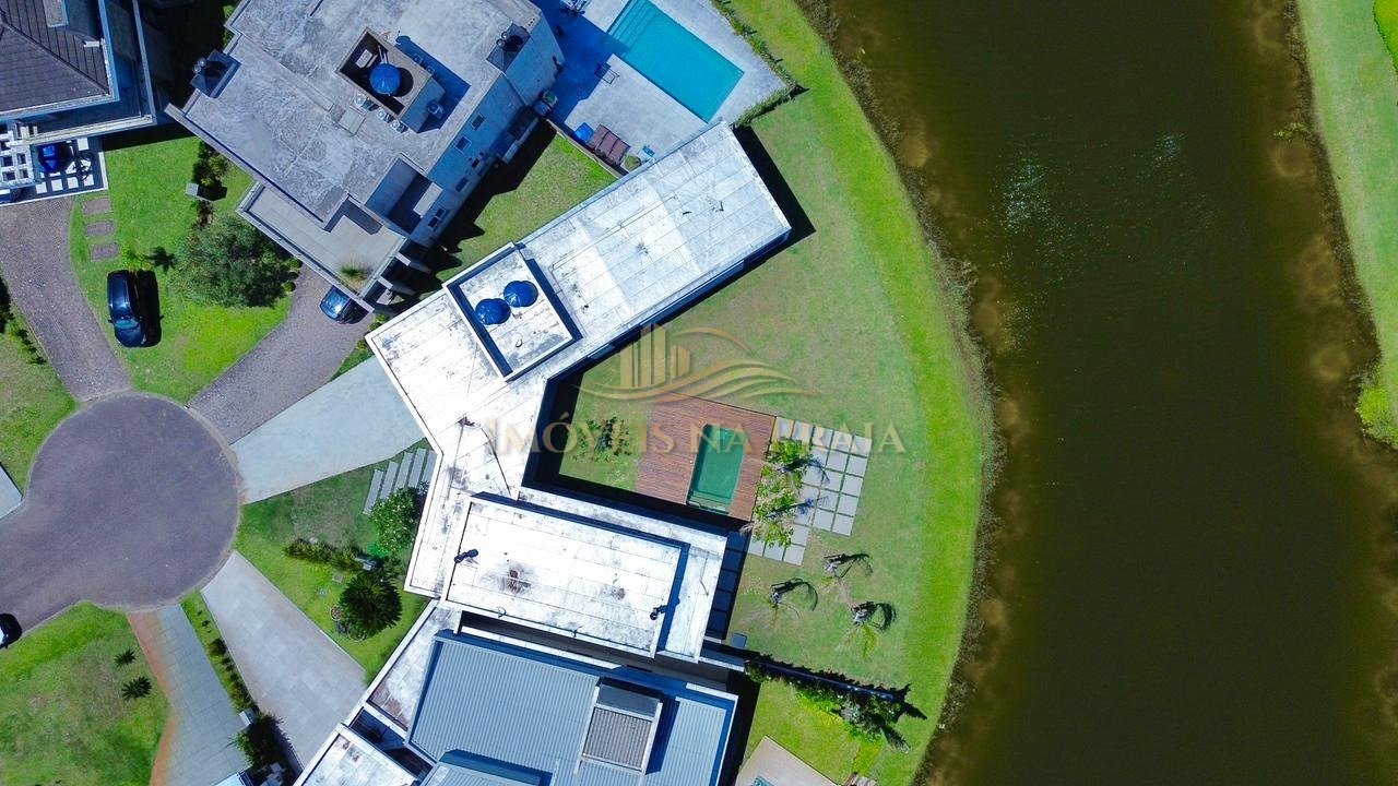 Foto 4 — Casa em Condomínio no Riviera Xangri-Lá.
