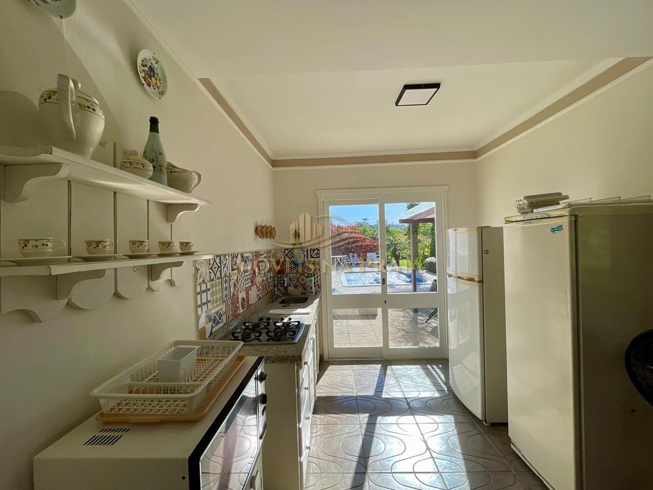 Foto 40 — Casa 4 dormitórios no bairro Atlântida