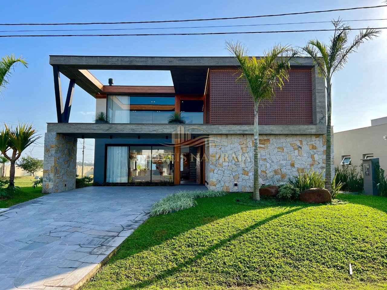 Casa em Condomínio 5 dormitórios no bairro Enseada Lagos de Xangri-lá