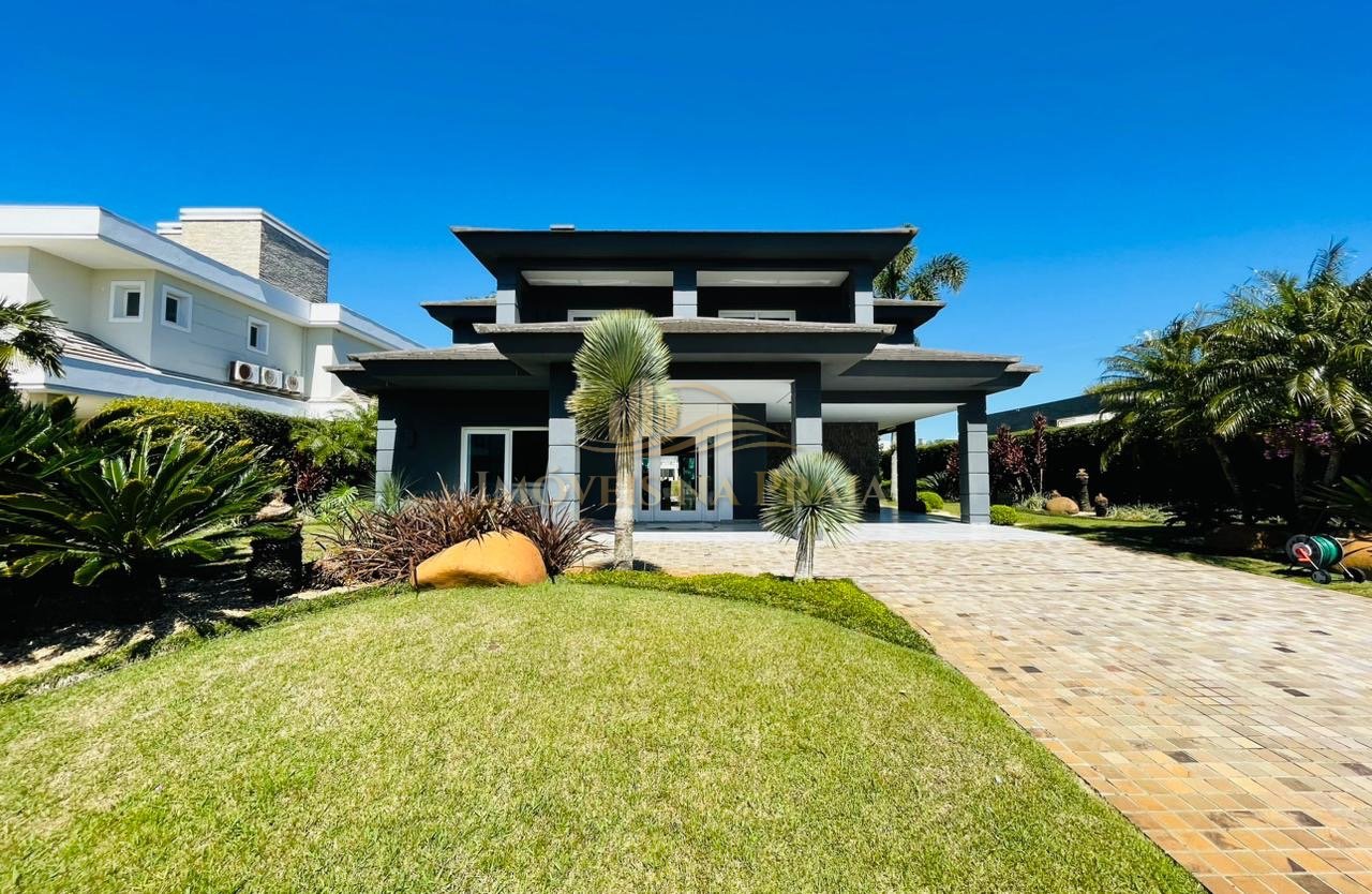 Foto 2 — Casa em Condomínio no Bosques de Atlântida.