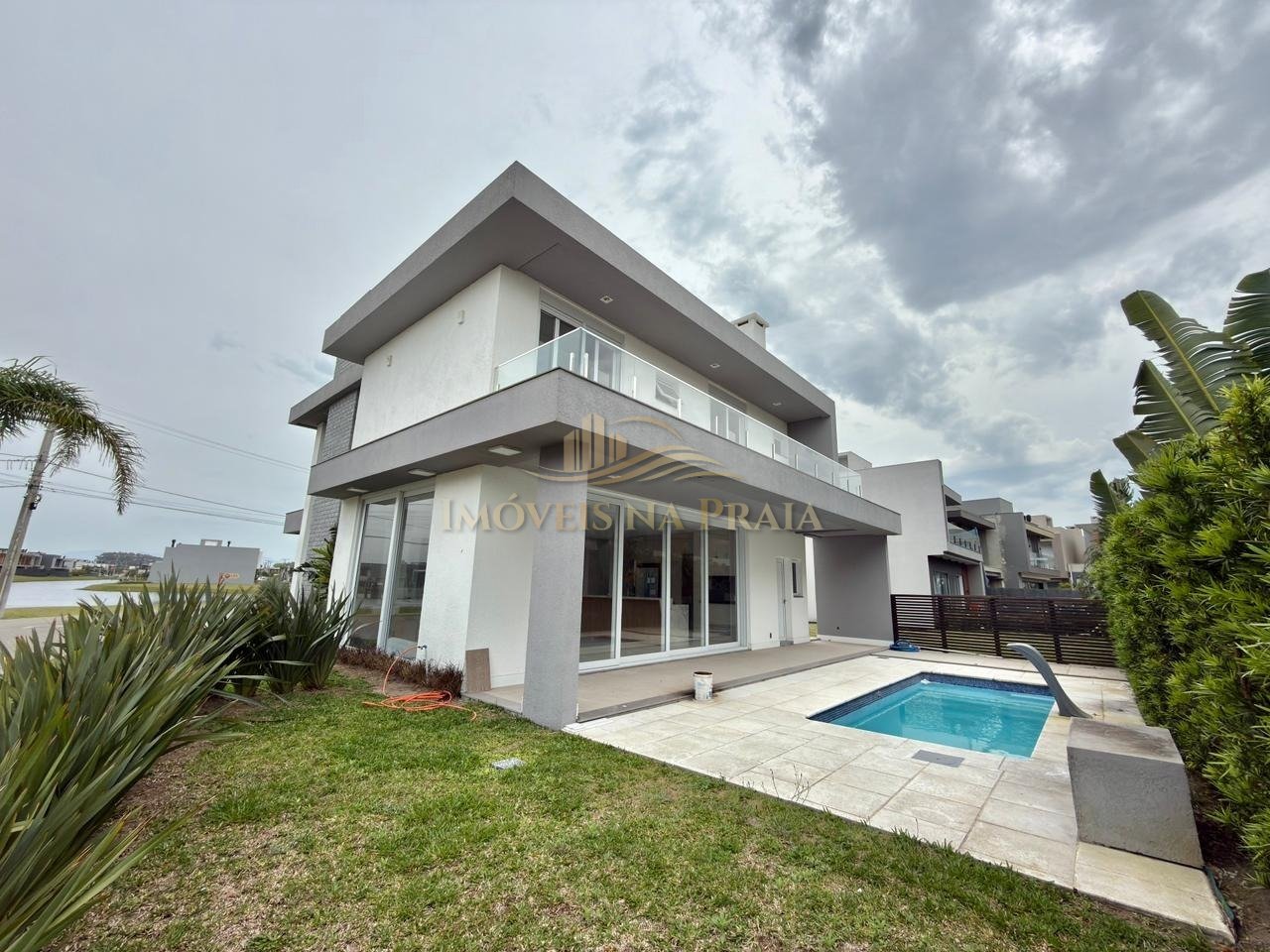 Foto 2 — Casa em Condomínio no Sunset.