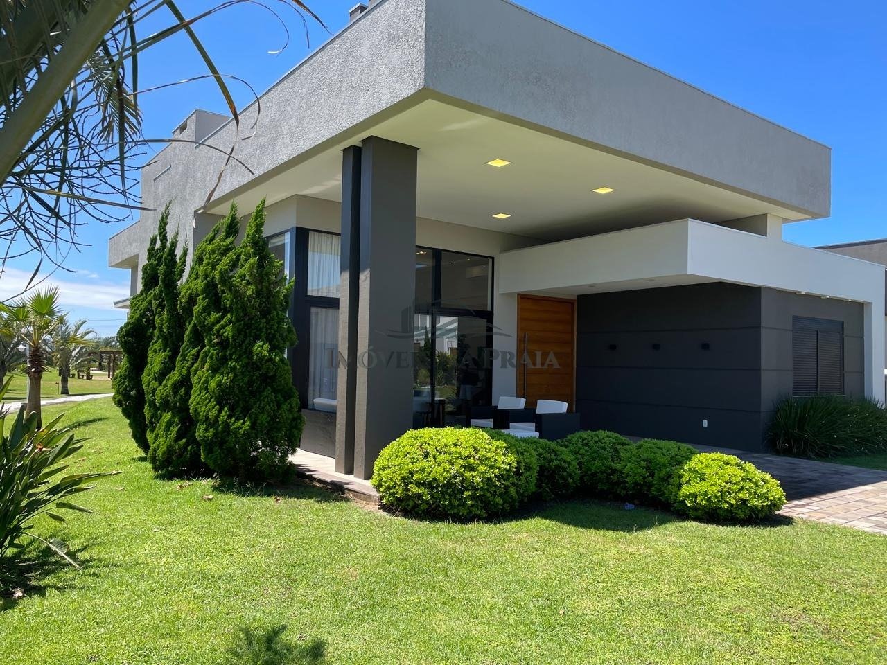 Foto 2 — Casa em condomínio no Riviera Xangri-Lá.